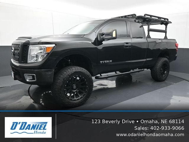 2017 Nissan Titan S in Magnetic Black — front three-quarter view