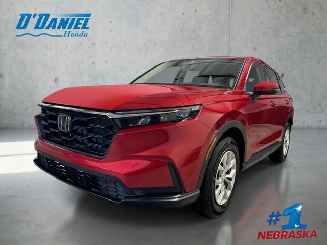2026 Honda CR-V LX in Radiant Red Metallic — front three-quarter view