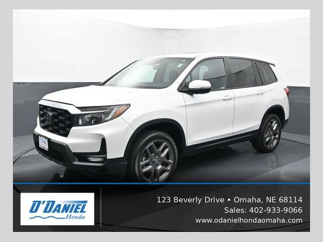2023 Honda Passport EX-L in White — front three-quarter view