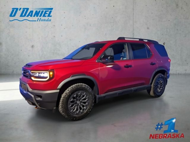 2026 Honda Passport TrailSport in Radiant Red Metallic II — front three-quarter view