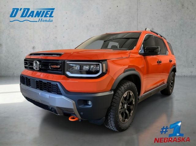 2026 Honda Passport TrailSport Elite in Sunset Orange — front three-quarter view