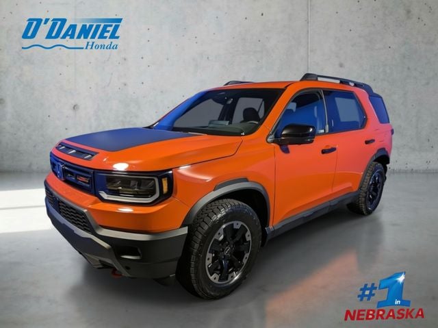 2026 Honda Passport TrailSport Elite in Sunset Orange — front three-quarter view