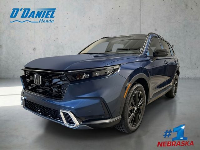 2026 Honda CR-V Hybrid Sport Touring in Canyon River Blue Metallic — front three-quarter view